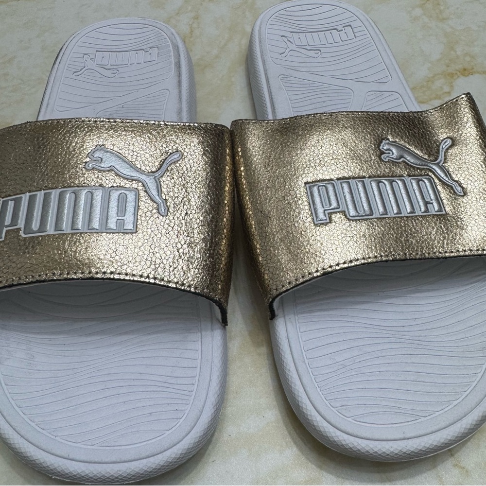 Puma White Slides with Gold Accents